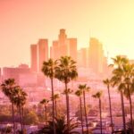 vista di LOs Angeles con palme e gratatcieli
